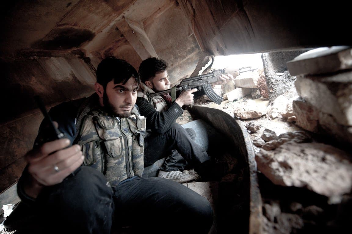 Just — Letters from Aleppo: rebel fighters in position, Syria, 2012