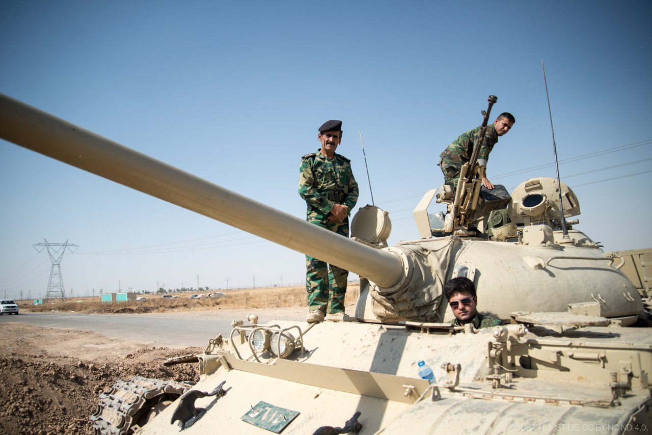 Iraq — Peshmerga soldiers on tank, 2014