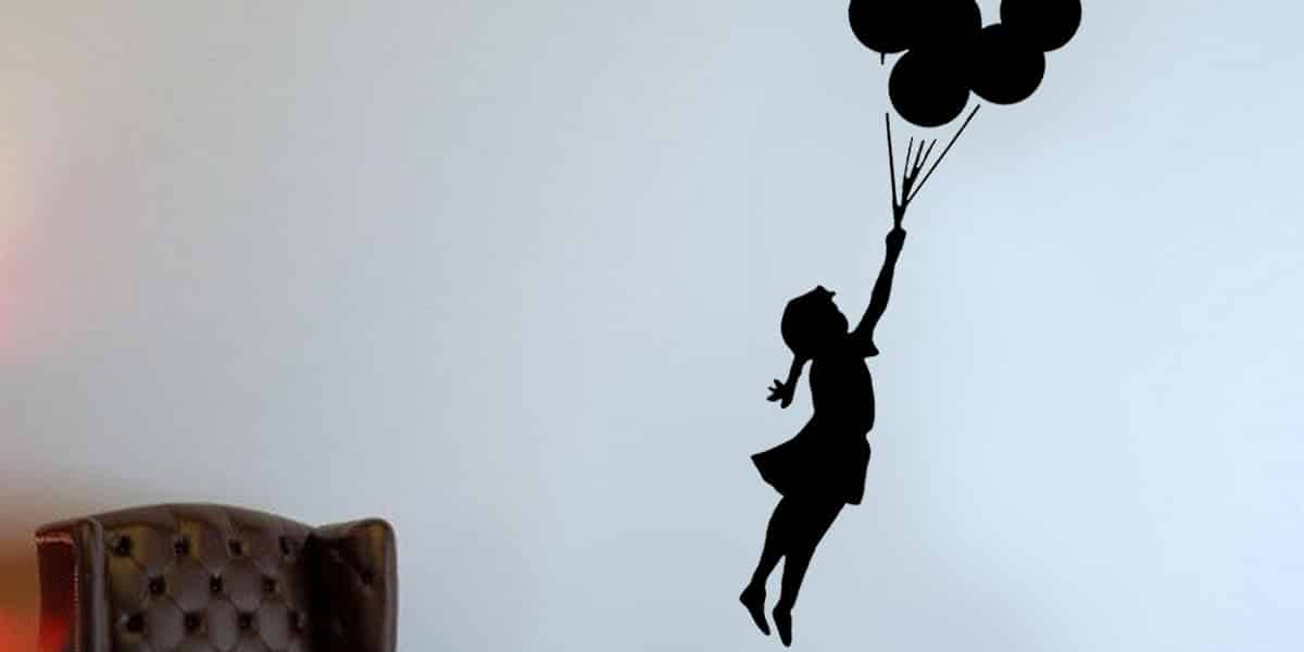 Wall sticker Woman is flying and holding of